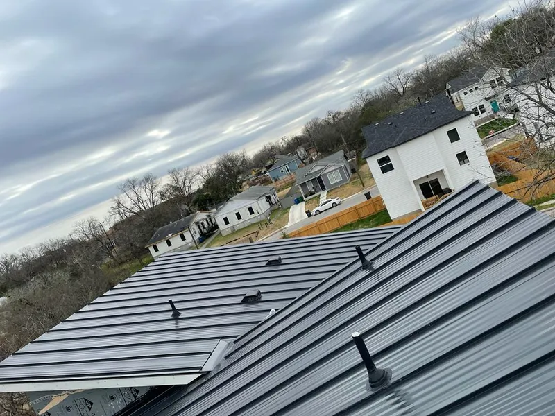 Standing seam metal roof panels with vents for Skylight Repair in West Lealman